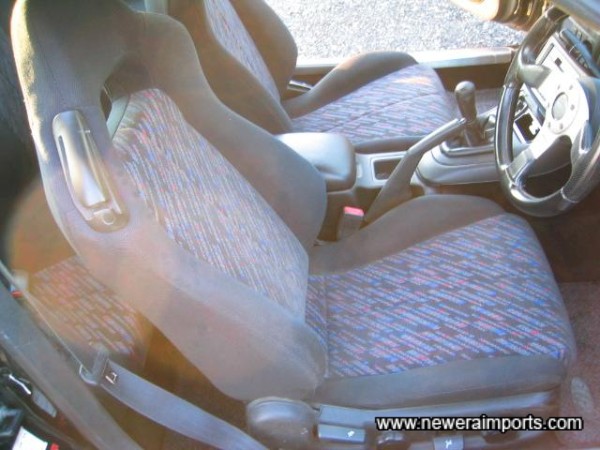 Driver's seat - has some wear to upright cushion, indicating this car was used for short trips. 