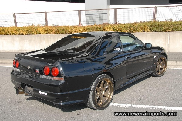 Note: An original R33 GT-R rear spoiler has now been fitted to this car.