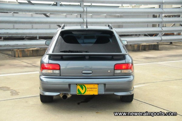 This car's been de-badged. Original replacement emblems are available via www.neweraparts.com