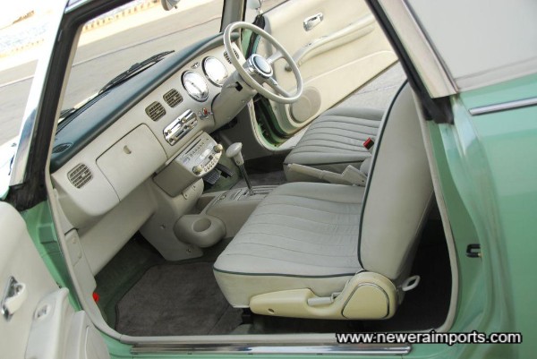 Interior is in excellent unmarked original condition - Note this has been a non-smoker's car since new.