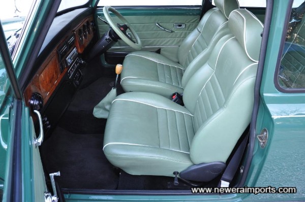 Full green prclain leather interior with Cooper embossing on front seats.